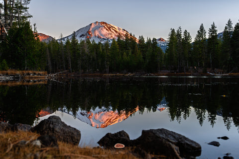 Mt Lassen Snow capped Mt Lassen glowing at sunset, mirrored in a calm lake