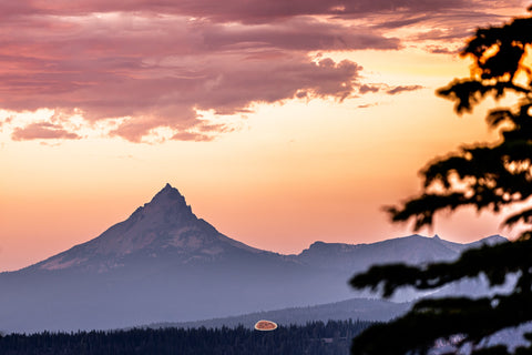 Mt Thielsen Jagged peak of Mt Thielsen against a pink and orange sunset sky